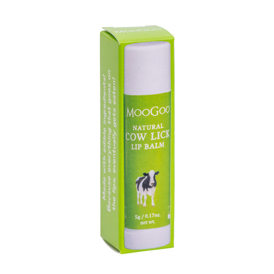 MooGoo Cow Lick Lip Balm on plain background, natural lip moisturiser with edible ingredients for smooth soft lips, petroleum free, all natural.
