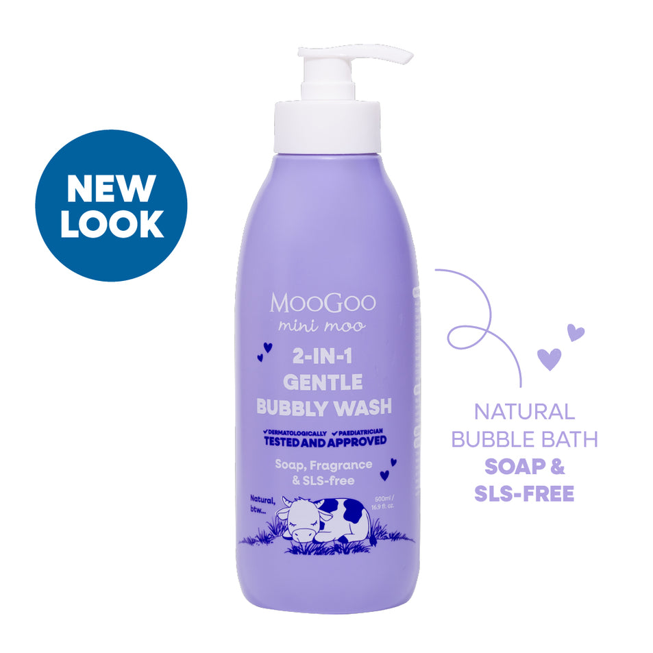 Purple bottle of MooGoo 2-in-1 Gentle Bubbly Wash with pump on a white background. Moogoo natural 2 in 1 bubbly wash in white background, Paediatrician approved gentle cleaner & bubble bath. Soap & SLS free