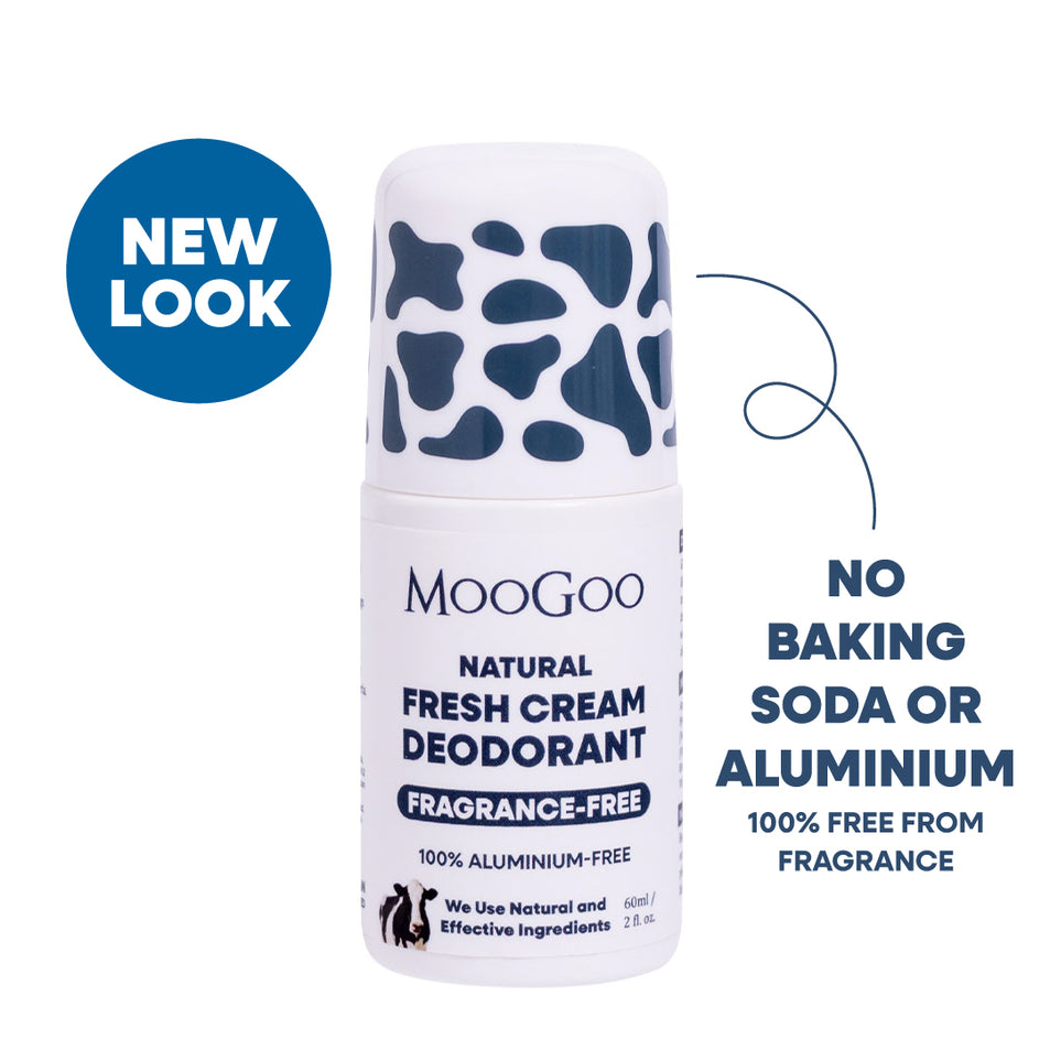 MooGoo Natural Fresh Cream Deodorant roll-on bottle with a white body and dark blue cow-print cap, shown on a white background with blue promotional text and a blue 'NEW LOOK' badge. Aluminium, Baking Soda  and fragrance free for sensitive under arms. 