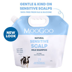 MooGoo Natural Sensitive Scalp Milk Shampoo refill pouch in light blue and white, featuring a cow illustration and text including 'Gentle & Kind on Sensitive Scalps' and a blue 'New Look' badge. Sulphate-free shampoo for scalp health. 