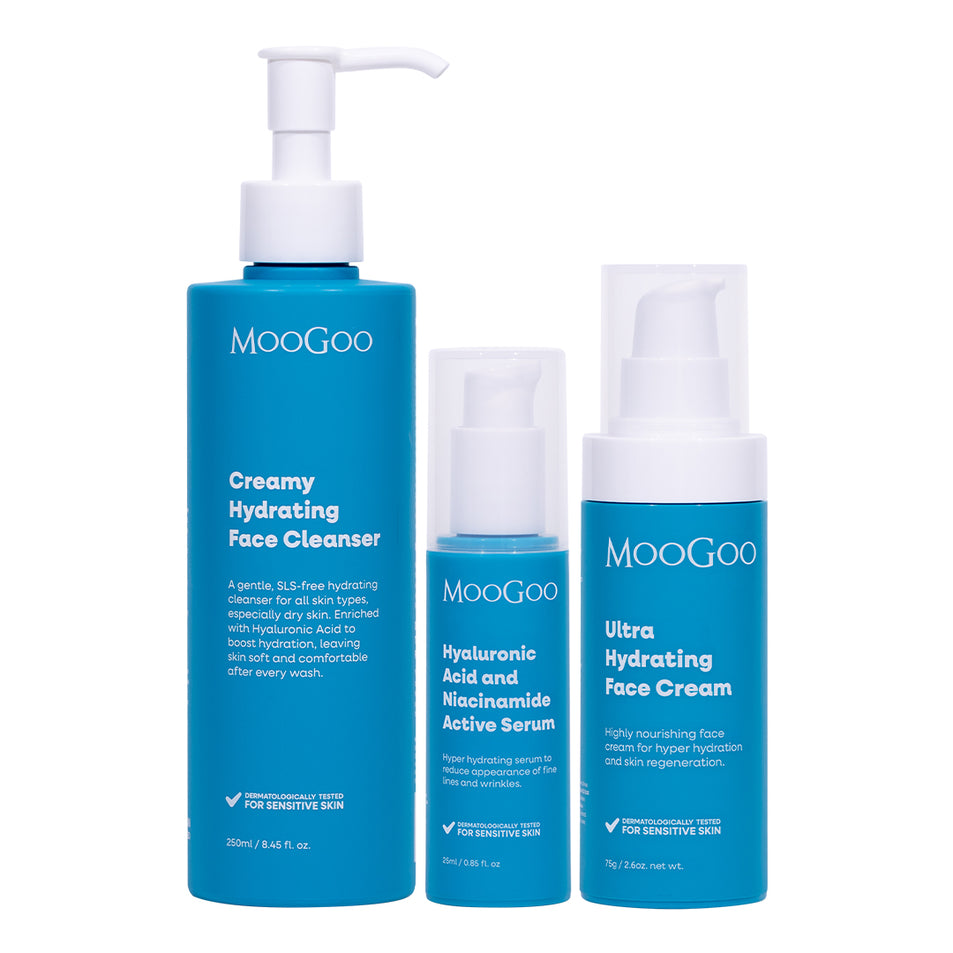 Face Hydration essentials pack including a creamy hydrating face cleanser, a hyaluronic acid and niacinamide face serum, and an ultra hydrating face cream, all in blue pump bottles.