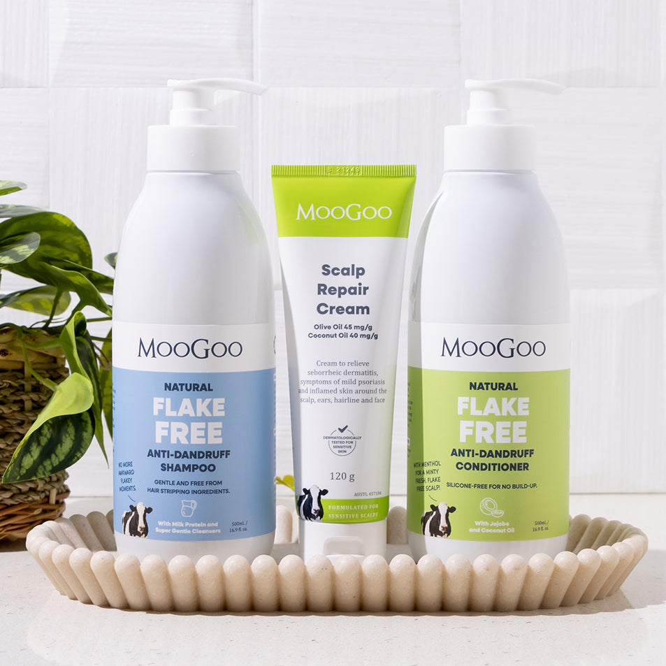 MooGoo Scalp Repair Pack on a basket, including natural shampoo, conditioner and scalp cream for dandruff and seborrheic dermatitis, gentle on sensitive scalps