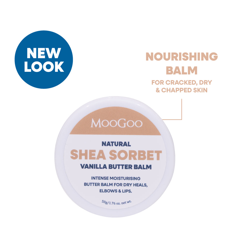 MooGoo Natural Shea Sorbet Vanilla Butter Balm in a round white jar with a white lid, featuring a beige label band and blue text. A blue circular badge on the top left reads 'NEW LOOK' with descriptive text on the right. Natural butter balm for dry, chapped and cracked skin. 