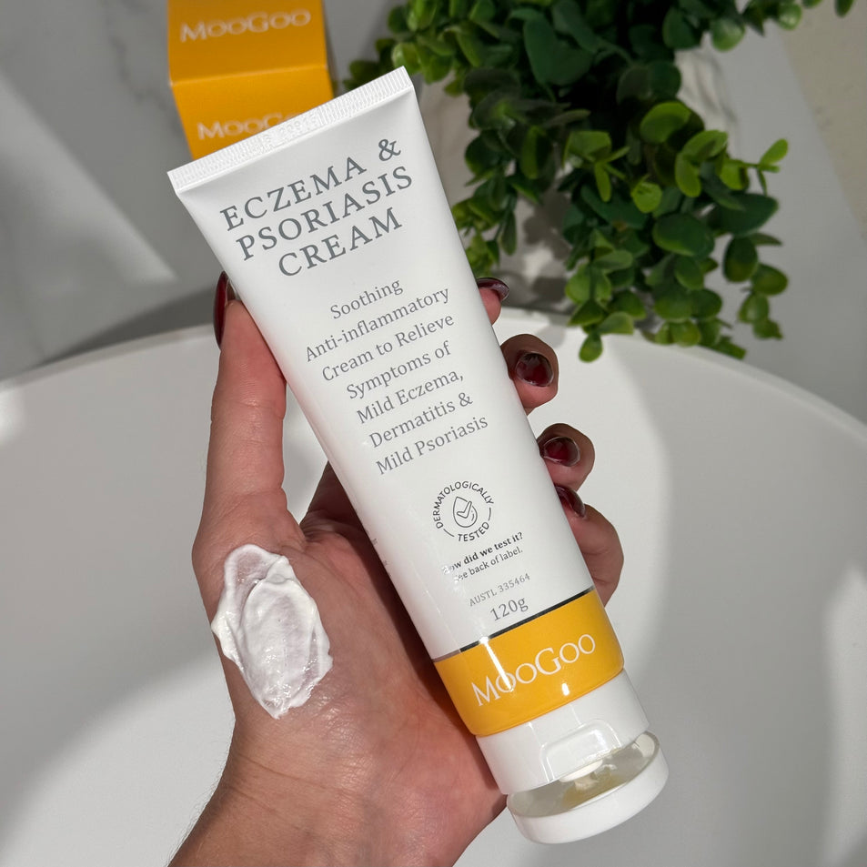 Eczema & Psoriasis Cream held with swatch spread on hand, Soothing anti inflammatory with Gotu Kola and Chamomile to relieve dry, red itchy skin, PH balancing formula, Dermatologically tested.