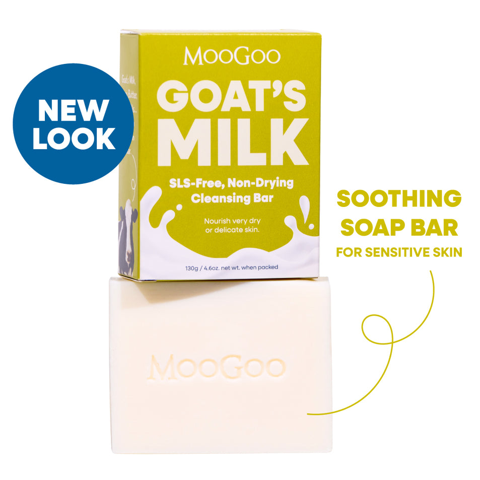 MooGoo Goat's Milk Soothing Cleansing Bar shown with its yellow-green packaging box and the bar itself on a white background, with text reading 'NEW LOOK' and 'SOOTHING SOAP BAR FOR SENSITIVE SKIN'. MooGoo Soothing Cleansing Bar Goat’s Milk on white background, nourishing SLS-free cleansing bar to calm and hydrate delicate or irritated skin.