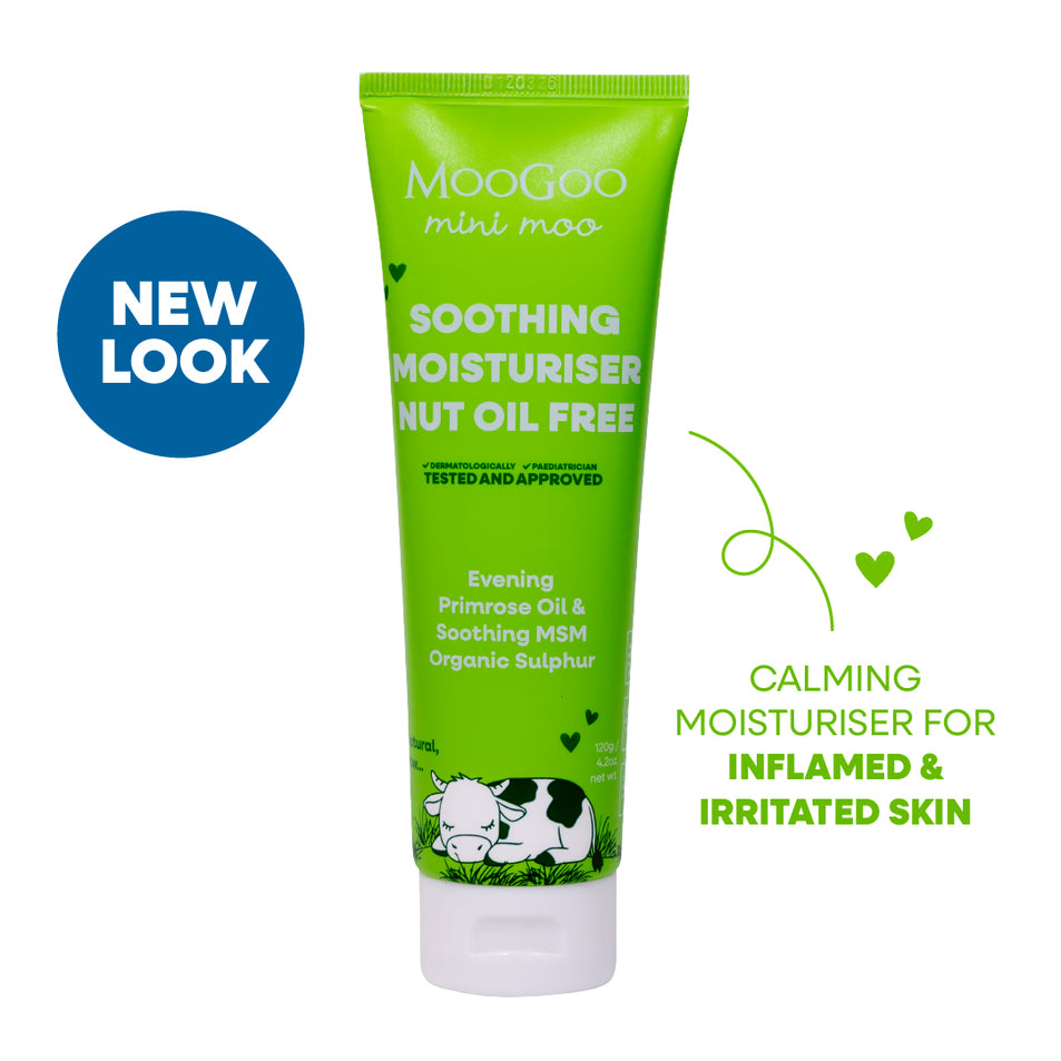 Green tube of MooGoo mini moo moisturizer on a white background. MooGoo Baby & Child Soothing Nut Oil Free Moisturiser, gentle daily lotion for nut-sensitive children and delicate skin care. 