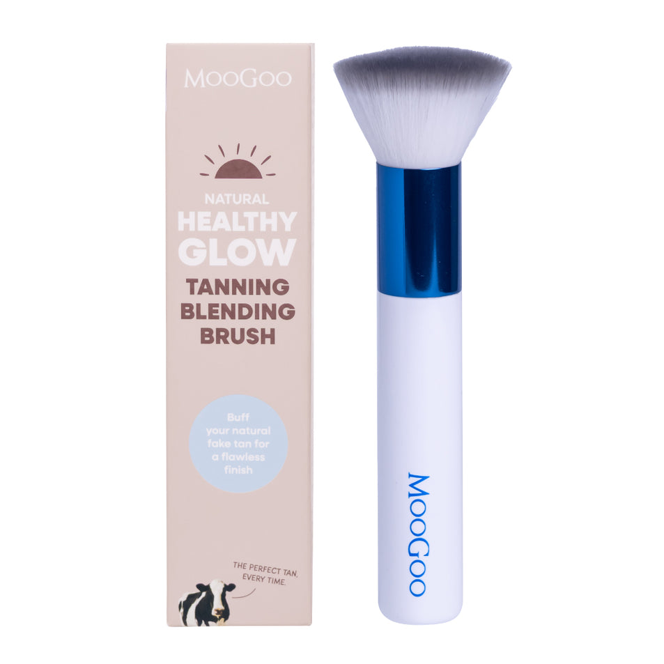 MooGoo Tanning Blending Brush on white background, self tanning accessory for even coverage, ensures streak-free bronzed finish.