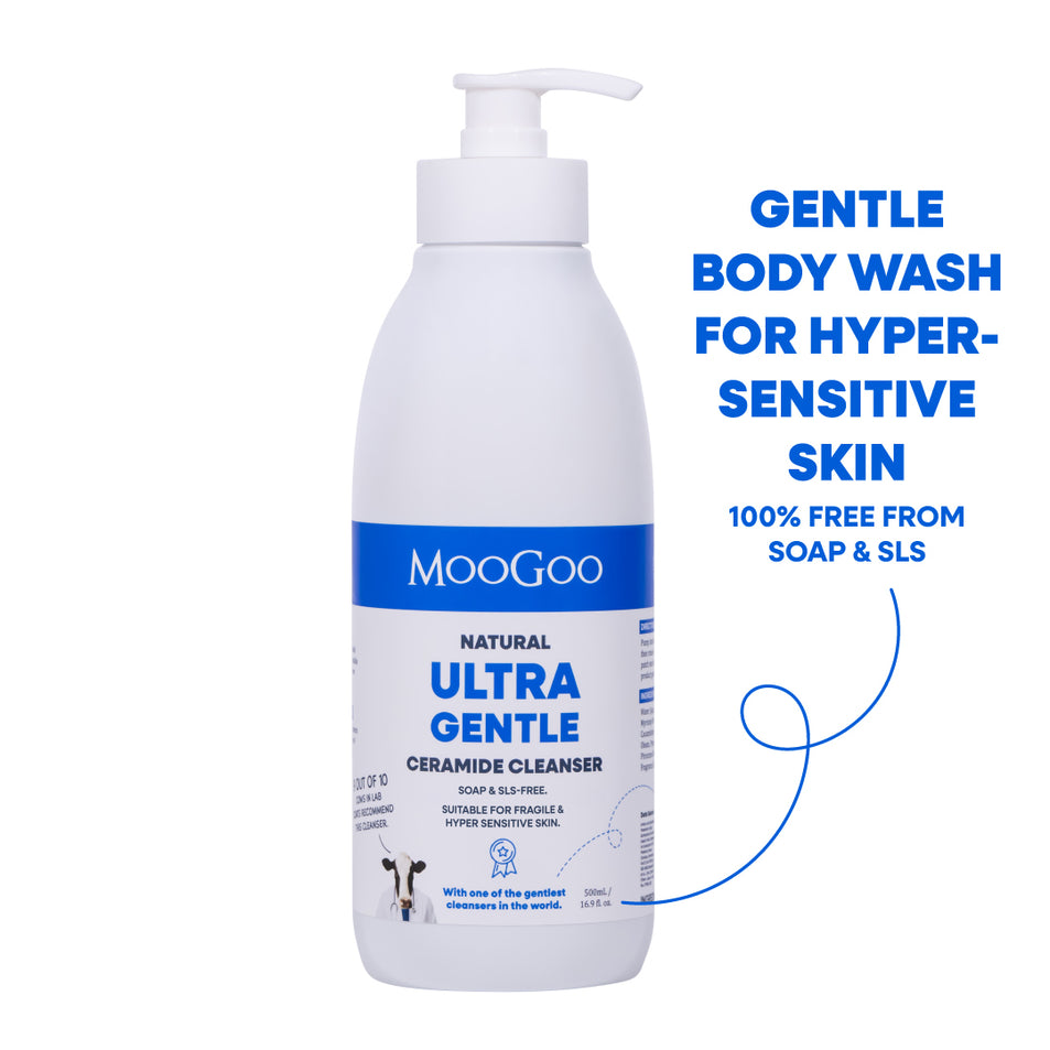 A white pump bottle of MooGoo Natural Ultra Gentle Ceramide Cleanser with a blue label band and blue text, shown on a plain white background. MooGoo Ultra Gentle Ceramide Cleanser on white background, for eczema prone and hypersensitive skin with ceramides to strengthen skin barrier